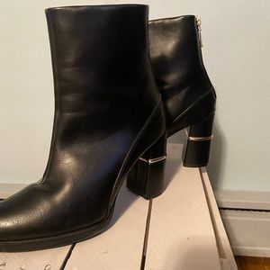 Black round toe faux leather booties